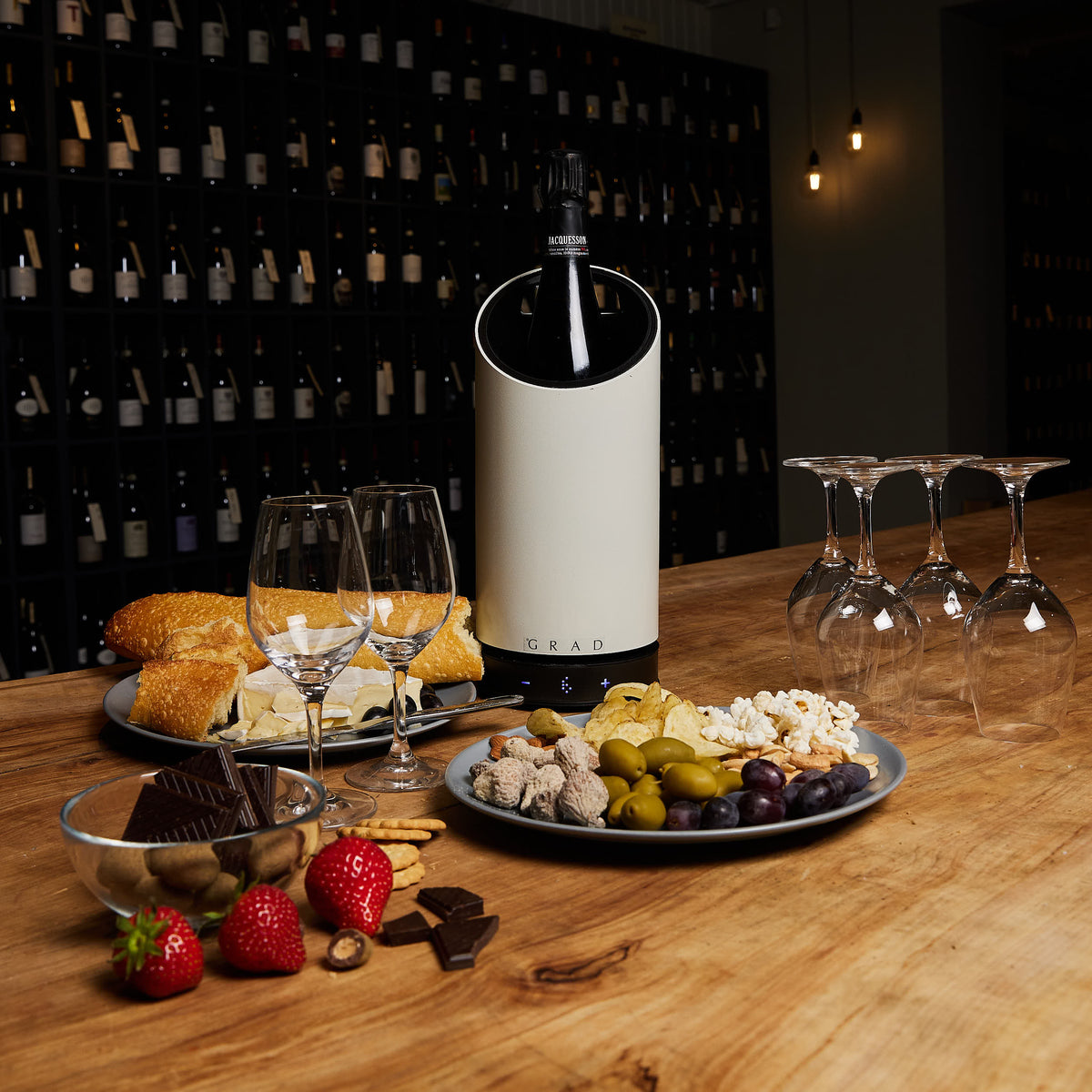 GRAD No.1 holding a bottle of champagne at 6 °C on a wine bar counter